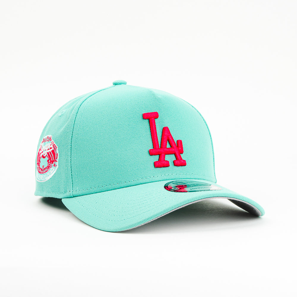 GORRA A FRAME NEW ERA DODGERS WORL SERIE 1915 AQUA/PINK
