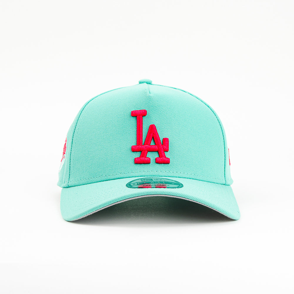 GORRA A FRAME NEW ERA DODGERS WORL SERIE 1915 AQUA/PINK