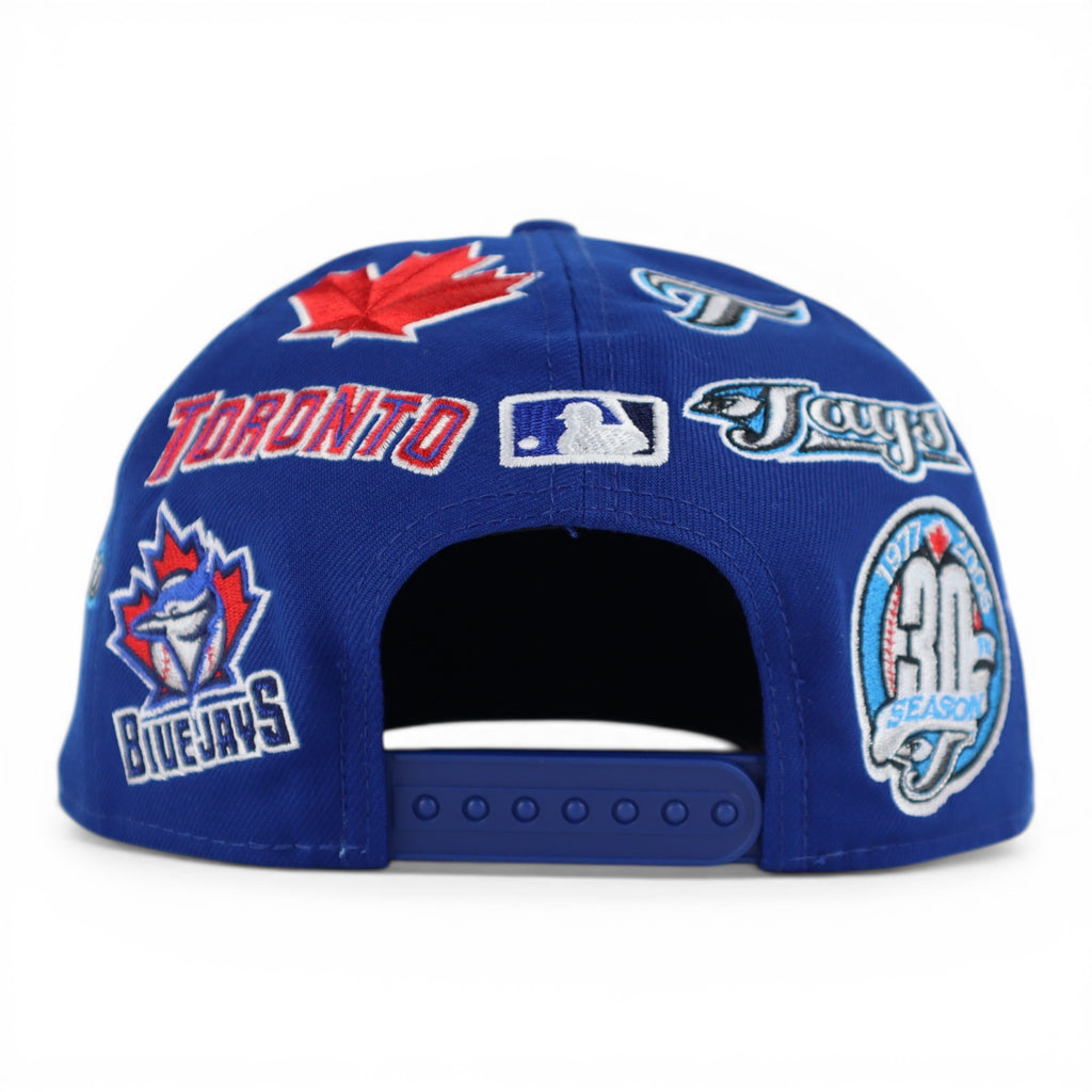 GORRA NEW ERA SNAPBACK 950 ALL OVER BLUE JAYS