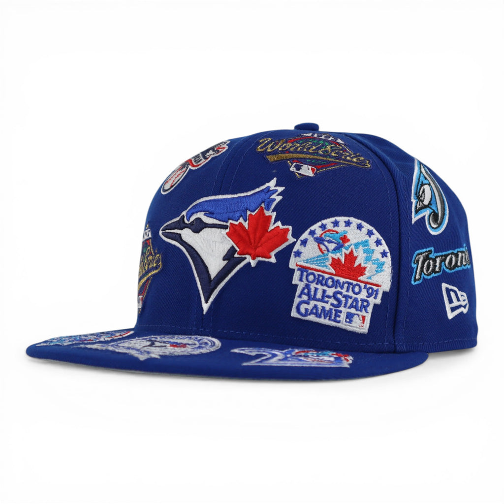 GORRA NEW ERA SNAPBACK 950 ALL OVER BLUE JAYS