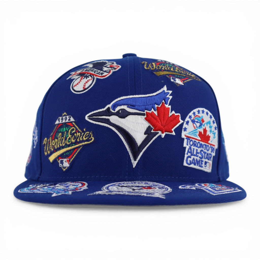 GORRA NEW ERA SNAPBACK 950 ALL OVER BLUE JAYS