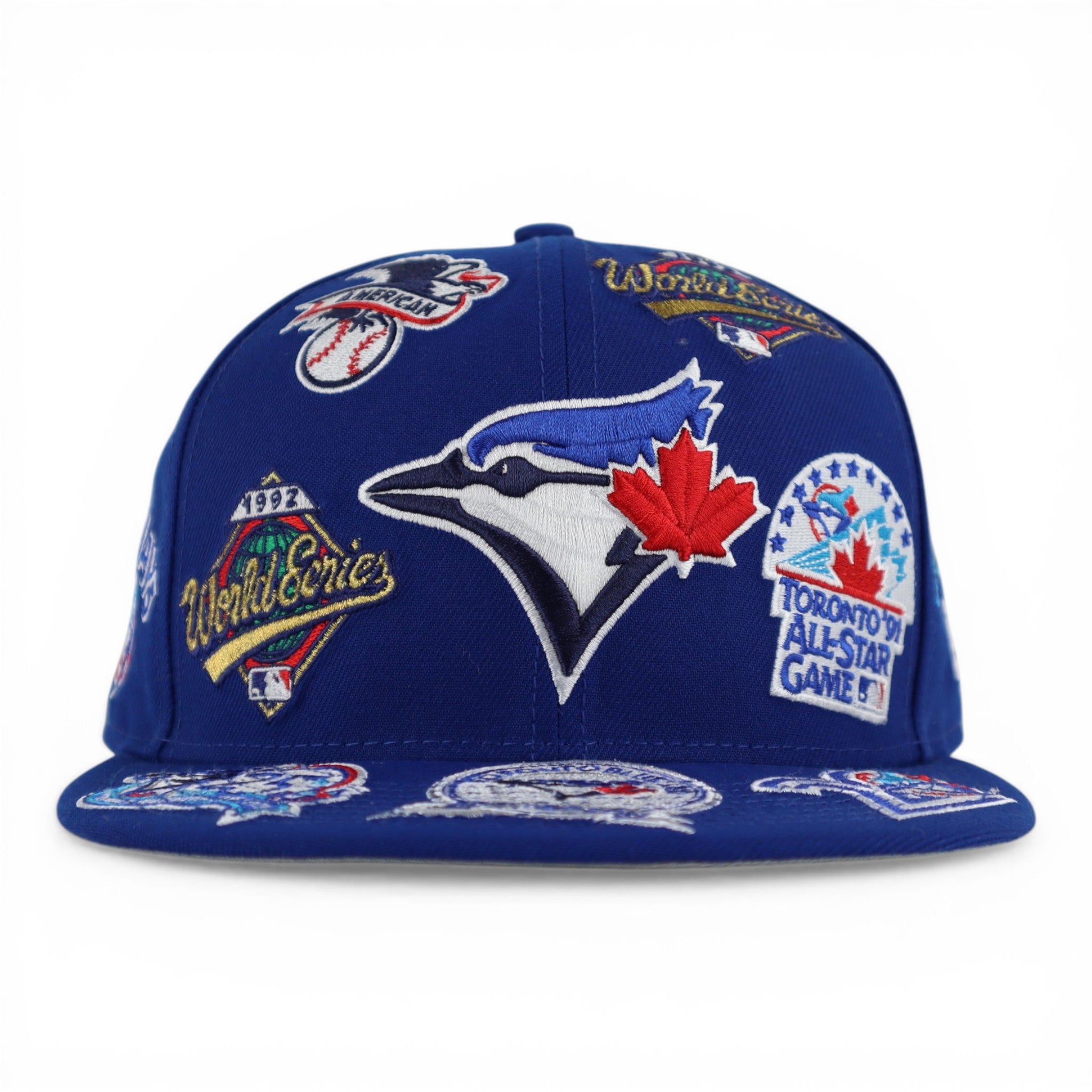 GORRA NEW ERA SNAPBACK 950 ALL OVER BLUE JAYS