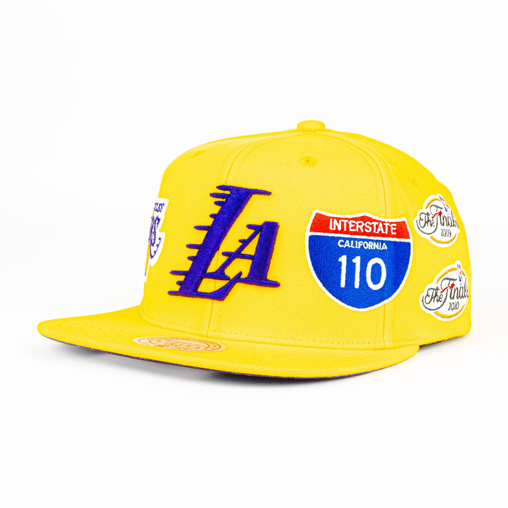 Gorra Mitchell&Ness LAKERS CHAMP PATCH GOLD | Snapback Visera Plana